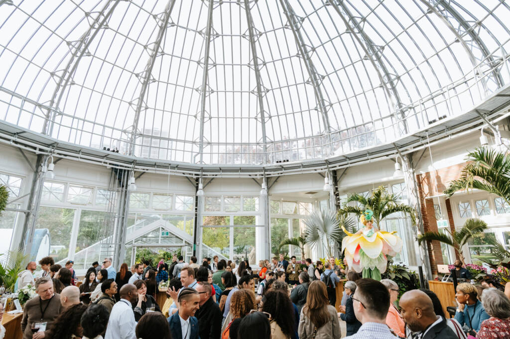 the palm house event space with a celebration taking place.