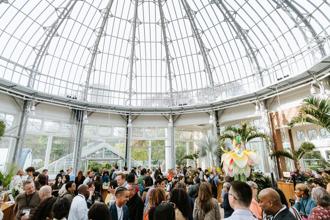 the palm house event space with a celebration taking place.
