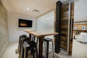Wooden Bar Table with Stools in meeting room