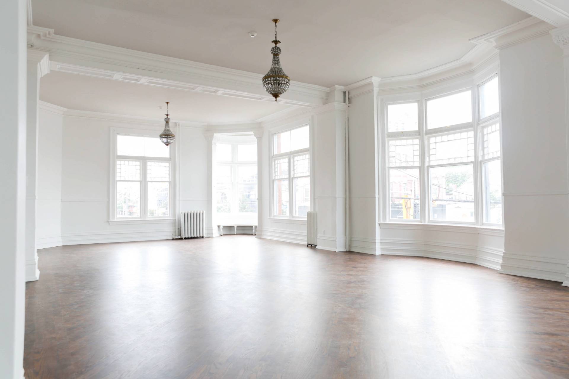 Bright white room with pendant lighting