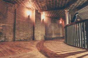Brickwalls with a rustic hardwood floor