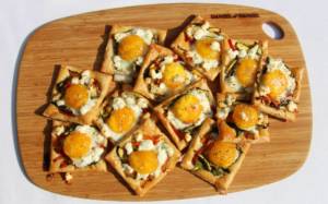 Baked Sunny Side Up Egg with vegetables on a galette.